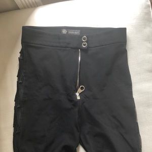 Versace pants with lace detailing on the sides.